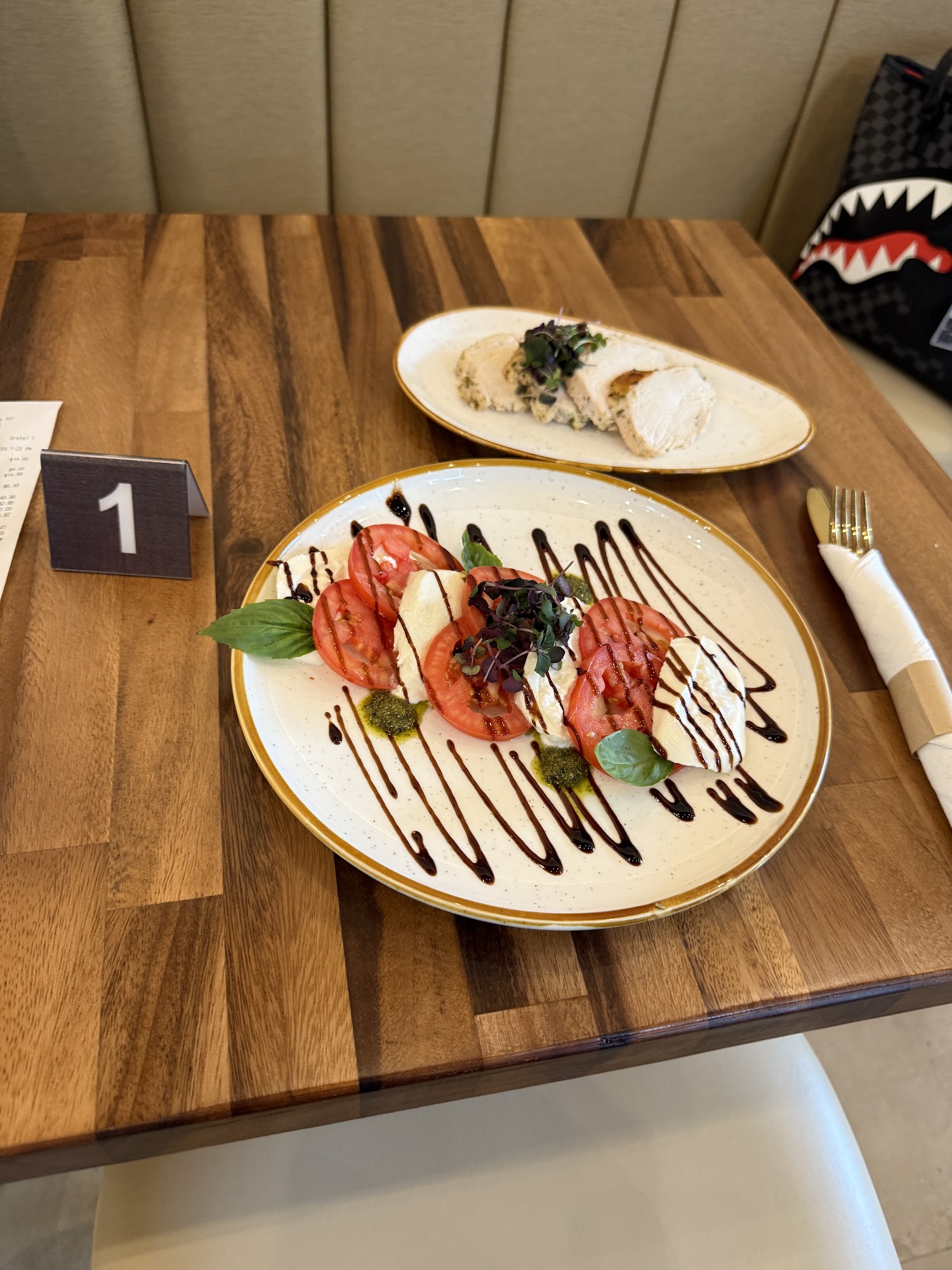 Plated food on a wooden café table